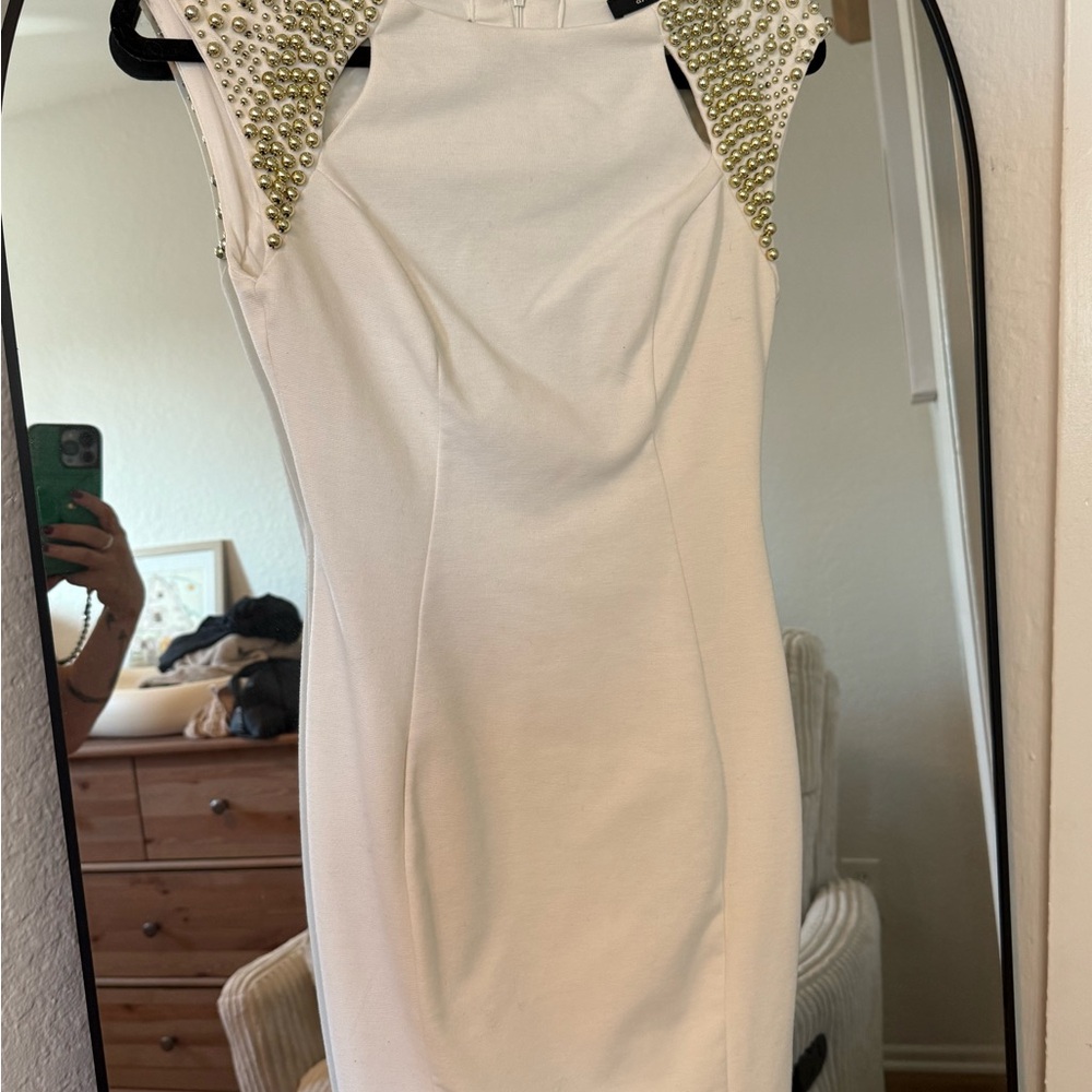 Elegant White Dress with Gold Accents